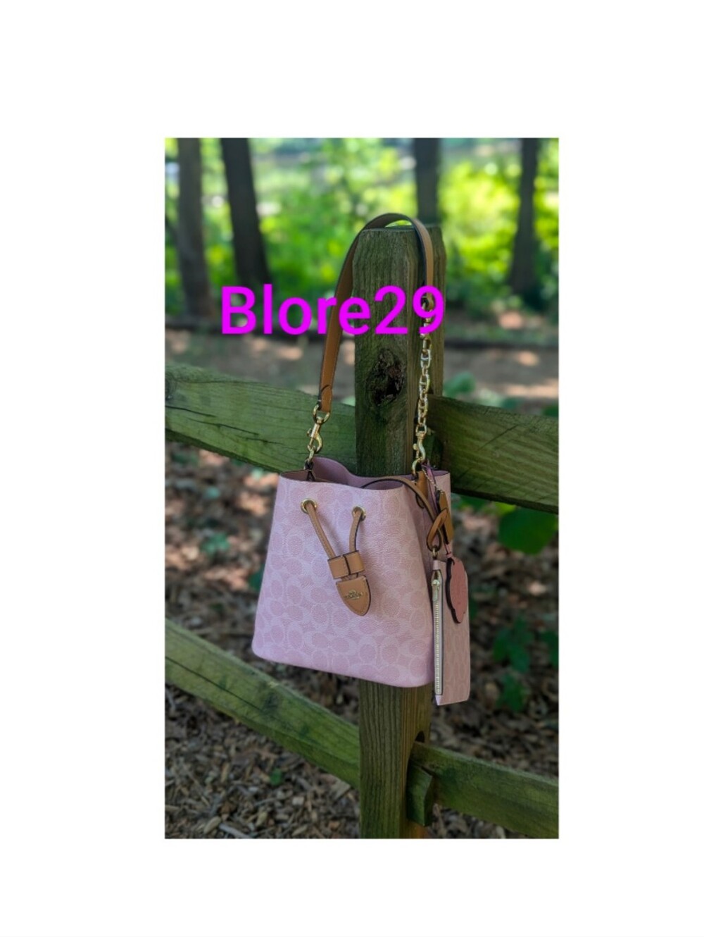 Coach Powder Pink Signature Bucket Bag with Floral Charm
